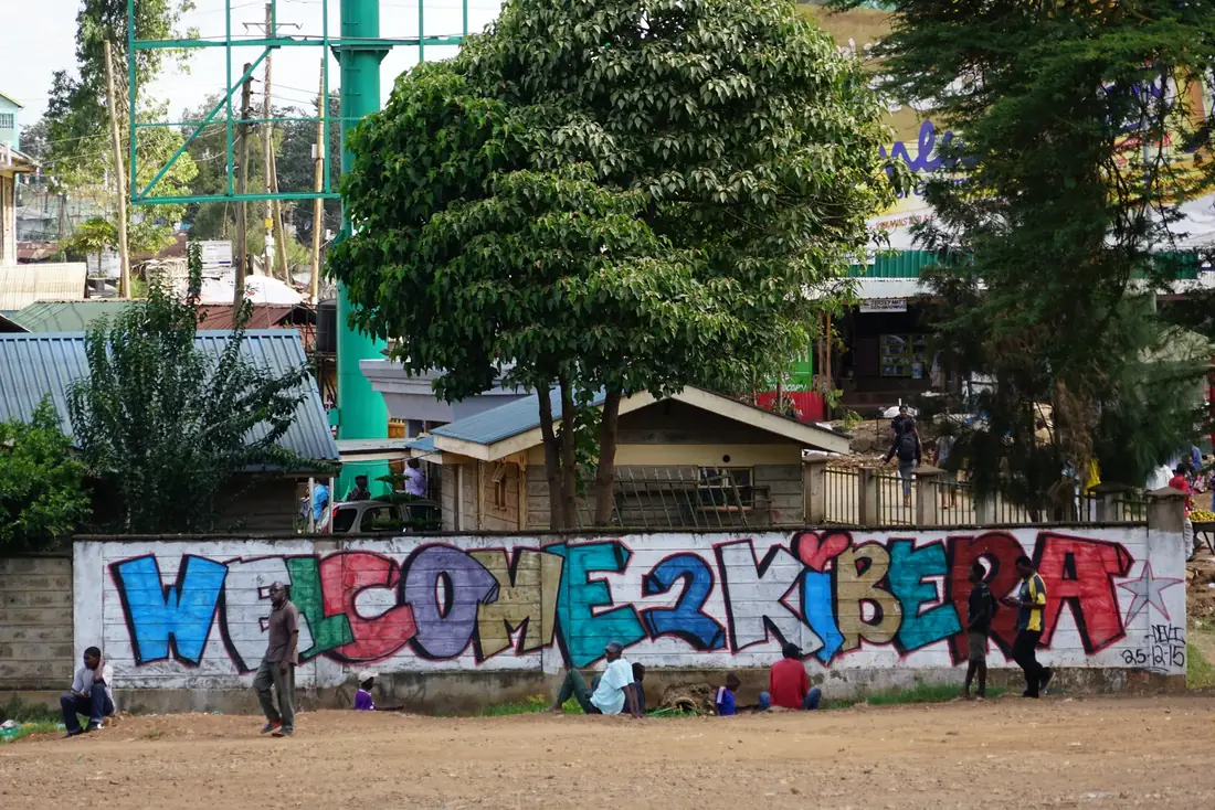A painted Welcome 2 Kibera wall